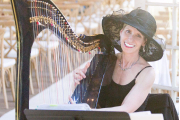 Soft Portrait of Anne Roos playing her Harp